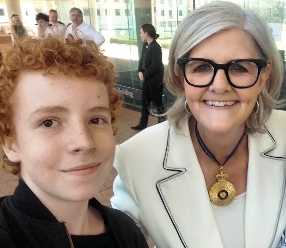 Young Eli Searle with Ms Sam Mostyn AC, Governor-General of the Commonwealth